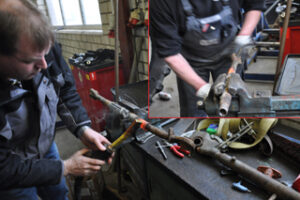 Rostige Welle wird mit Tiefeninduktion zum Glühen gebracht und gelöst.